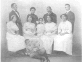 John Gideon Lewis, Sr. with family including Scott Lewis (far right) and John Lewis, Jr. (front, sitting)